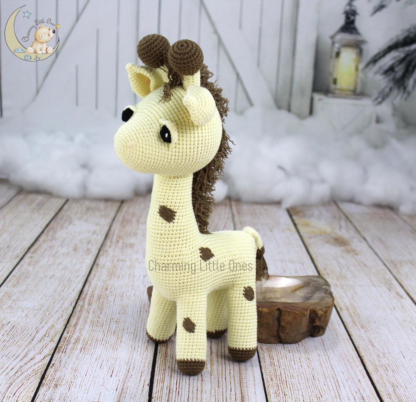 Handmade crochet giraffe, 14.5 inches tall, with yellow body, brown spots, and a fluffy mane.