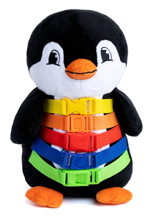 Plush penguin toy with five colorful buckles on its belly, white face and belly, orange beak and feet.