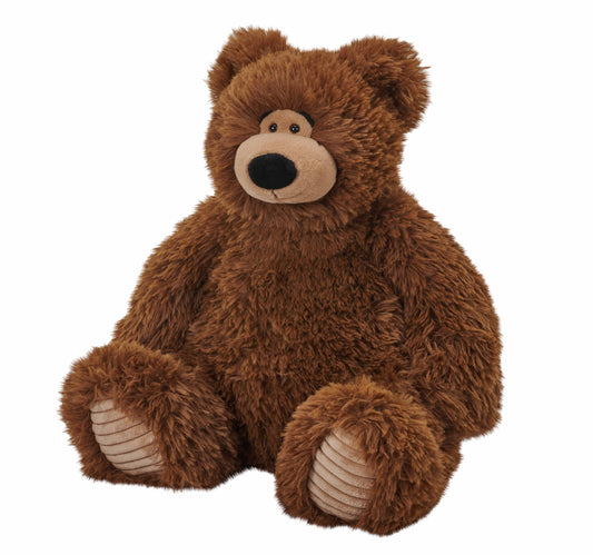 Fluffy brown bear stuffed animal with soft shaggy fur sitting upright