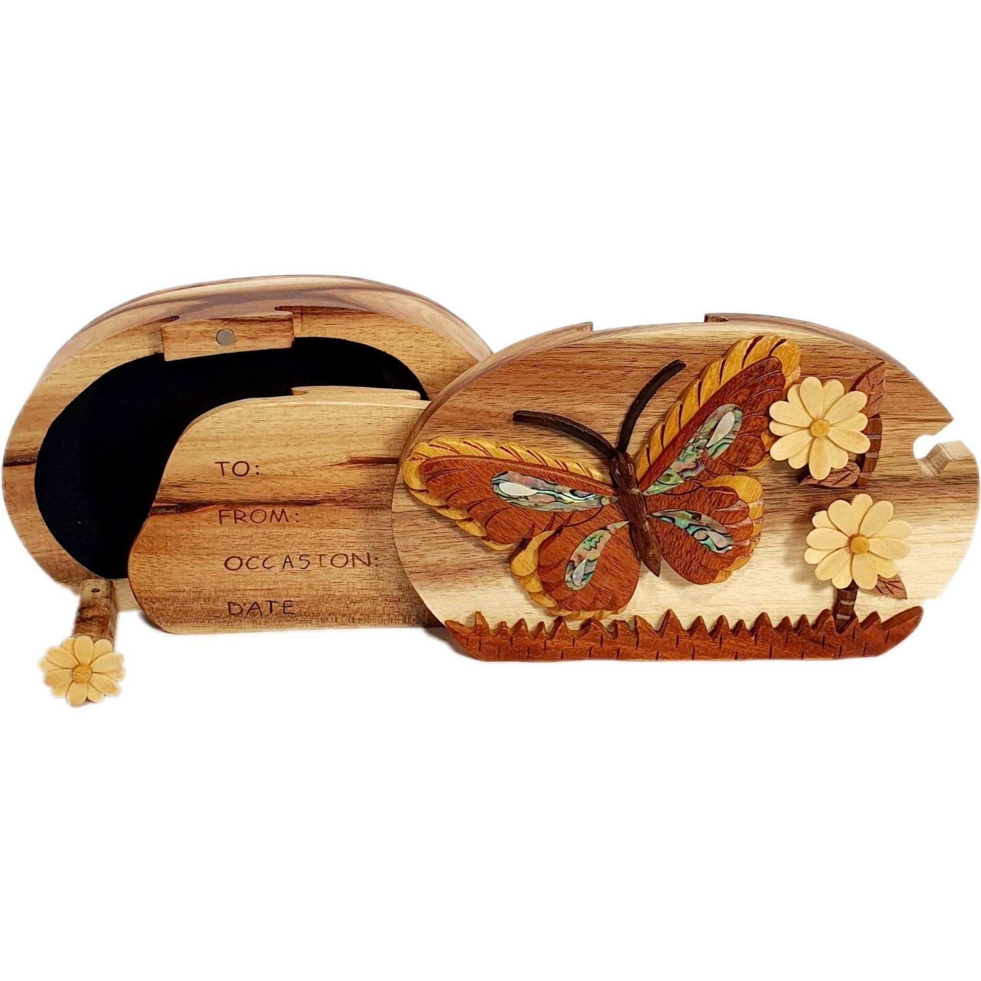 Hand-carved wooden keepsake box with a butterfly and daisies design, featuring mother of pearl inlay.