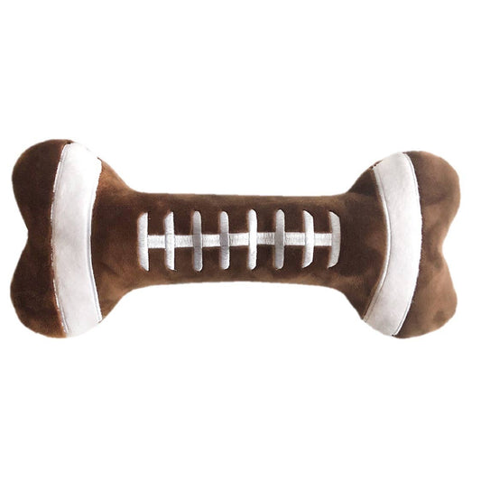 Plush dog toy shaped like a brown football bone with white stitching
