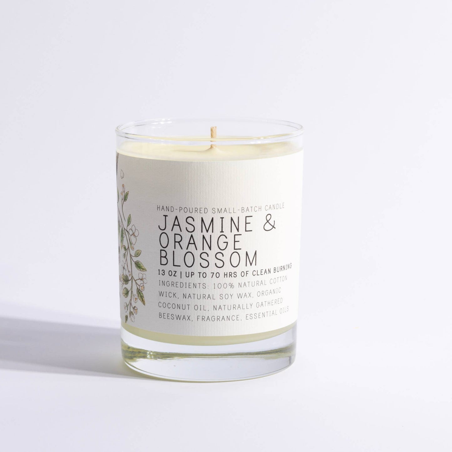 Hand-poured jasmine and orange blossom candle in a large glass jar with decorative label, ideal for Christmas gifts or as a thoughtful present for her.