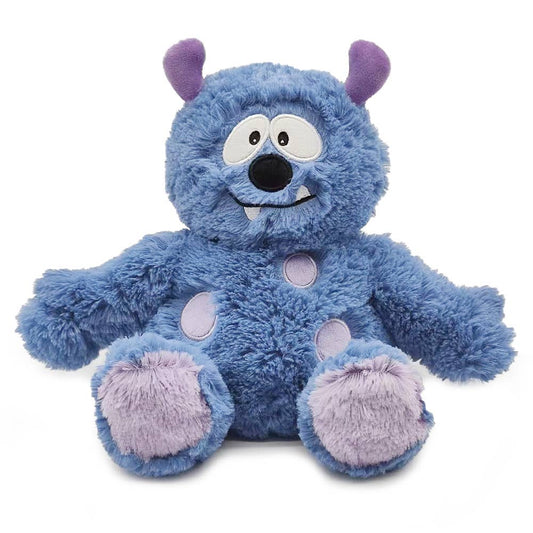Fluffy blue plush monster with purple horns, stitched fangs, and lavender paw pads and spots.
