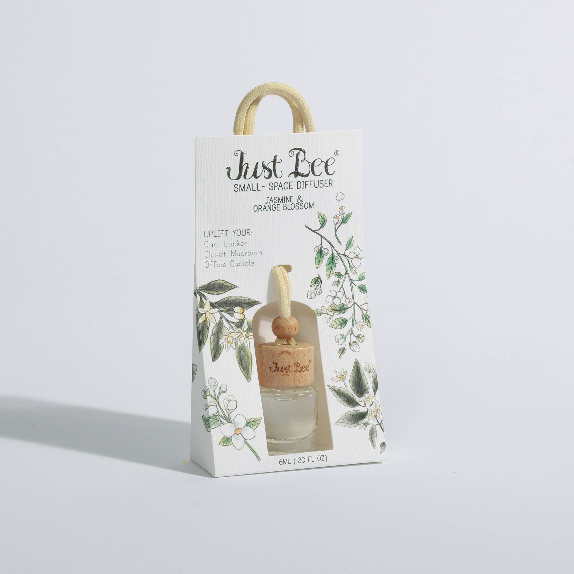 Small hanging diffuser in a floral box with wooden cap and loop