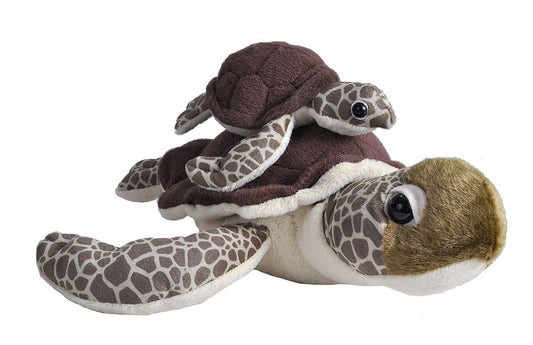 Stuffed green sea turtle with baby on its back, plush toy, lifelike design.