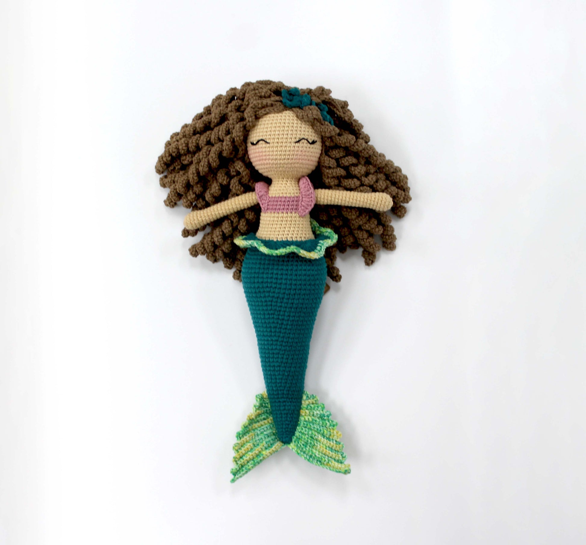 Handmade crochet mermaid doll with brown hair, pink top, and teal tail, 12 inches long.
