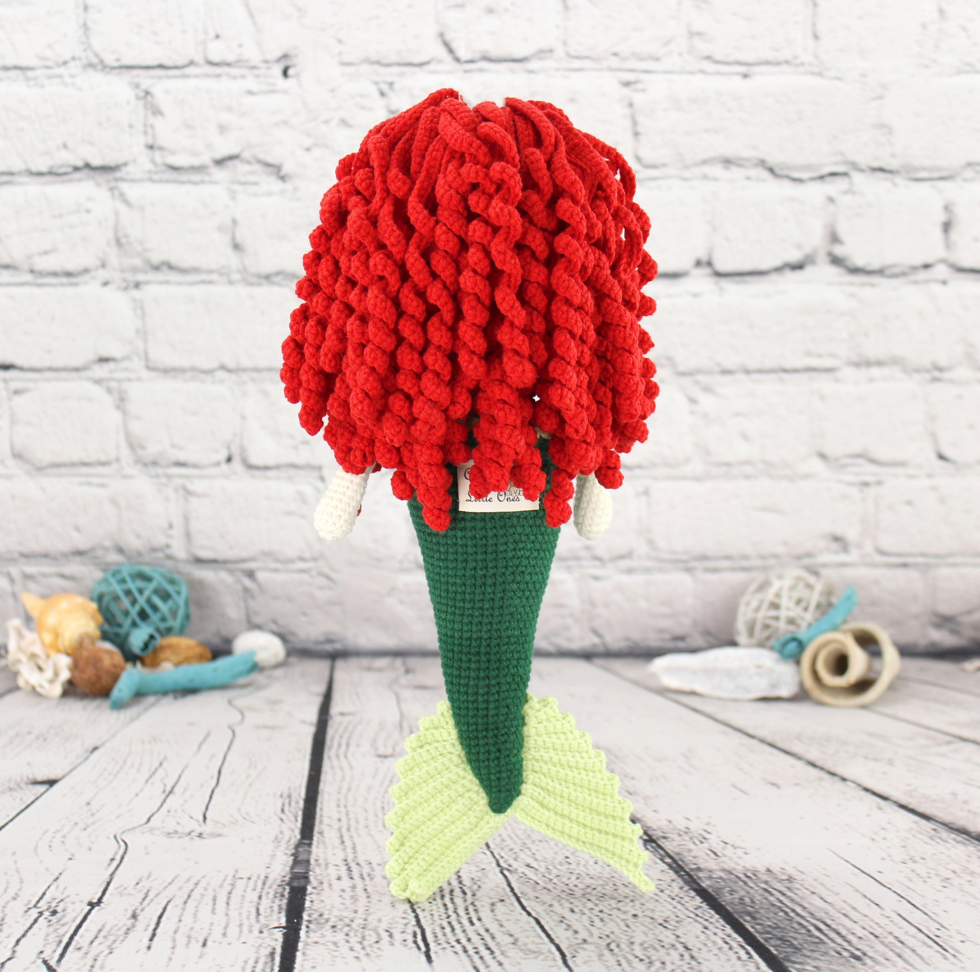 "Handmade amigurumi crochet mermaid doll with red hair, green tail, and light green fins, standing 12 inches tall."