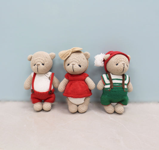 Handmade 8-inch Christmas teddy bear in festive red and green outfit, perfect for holiday cheer.
