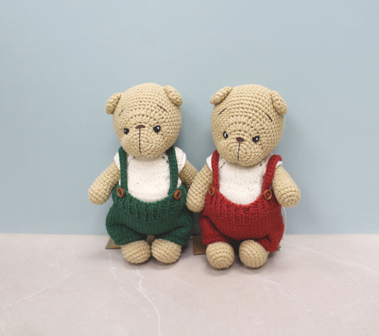 Handmade 8-inch Christmas teddy bear in beige with red overalls, perfect for festive gifting.