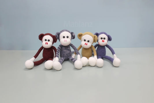 Handmade crochet monkey stuffed toy, 13 inches, in assorted colors with white hands and feet.