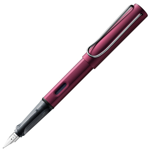 Matte plum-toned aluminum fountain pen with extra fine black nib and ergonomic transparent grip.