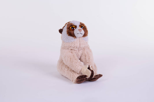 Plush slow loris toy with soft beige and brown fur, seated upright