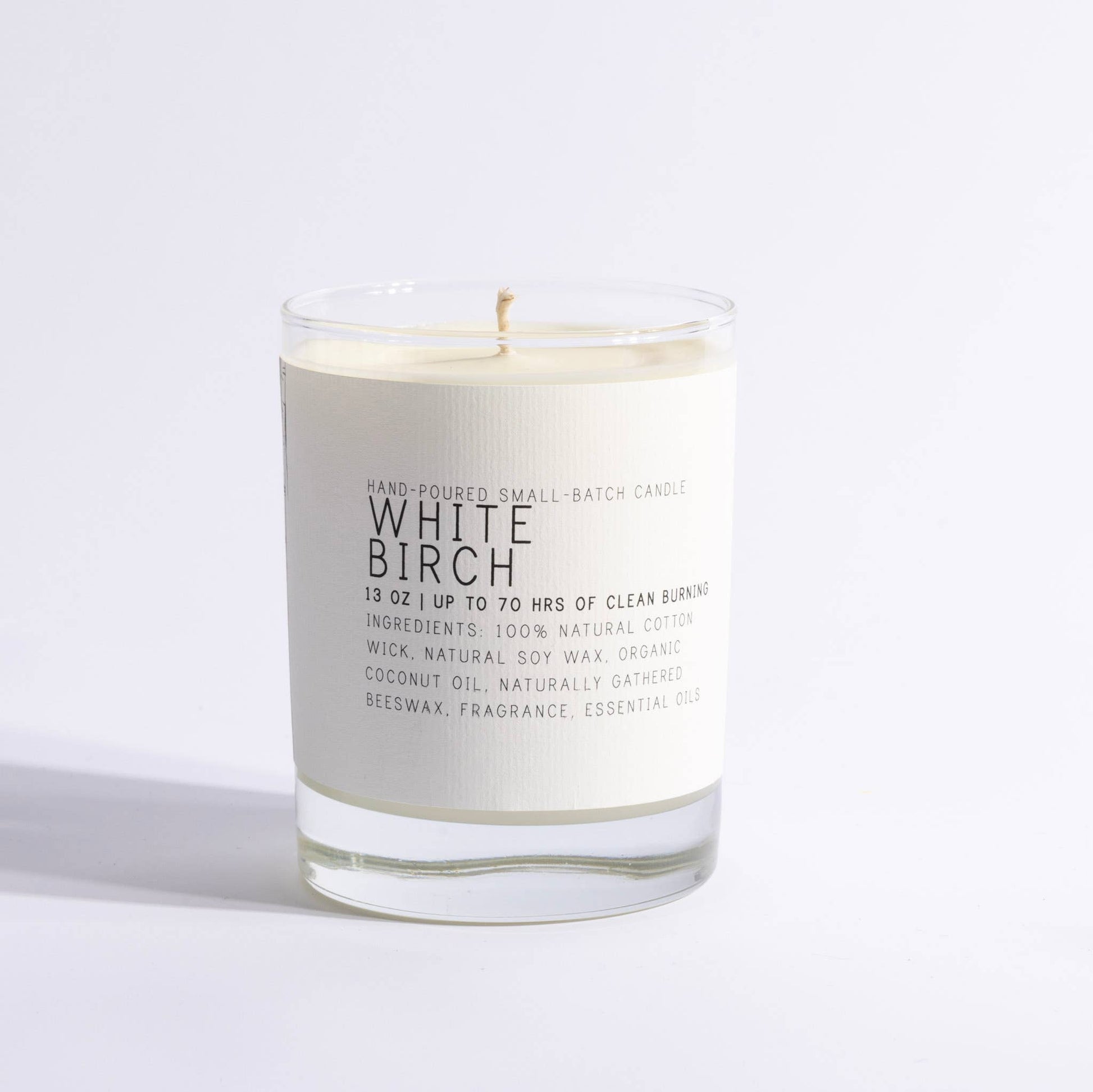 White Birch scented candle in clear glass jar with minimalist label