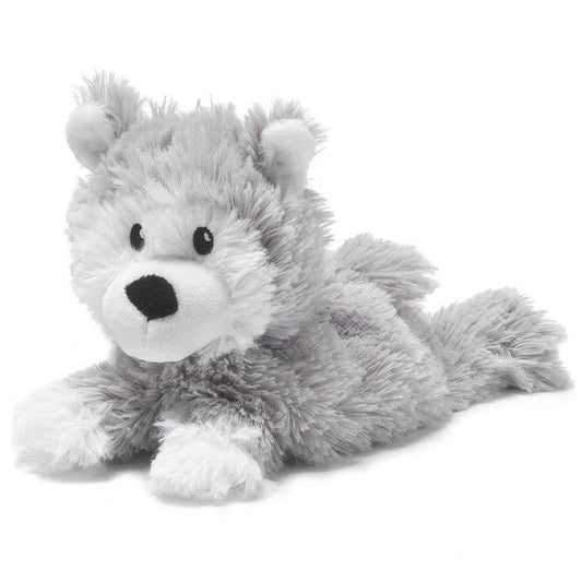 Soft gray plush husky lying down with white snout and paws
