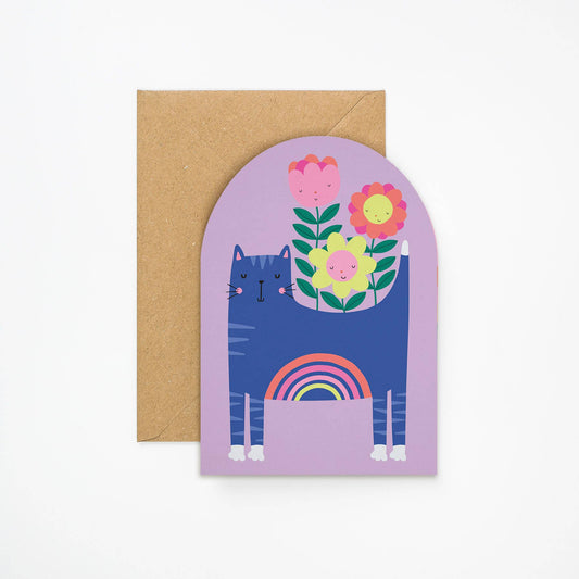 Lilac arched greeting card with a blue cat, rainbow belly, and smiling flowers
