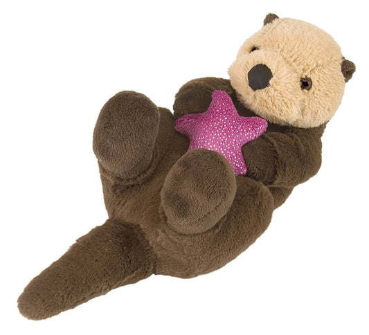 Soft brown sea otter plush holding a pink star