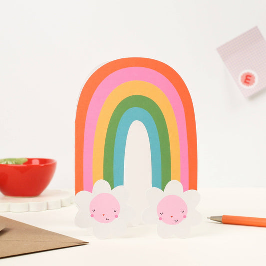 Rainbow-shaped greeting card with two smiling flower characters