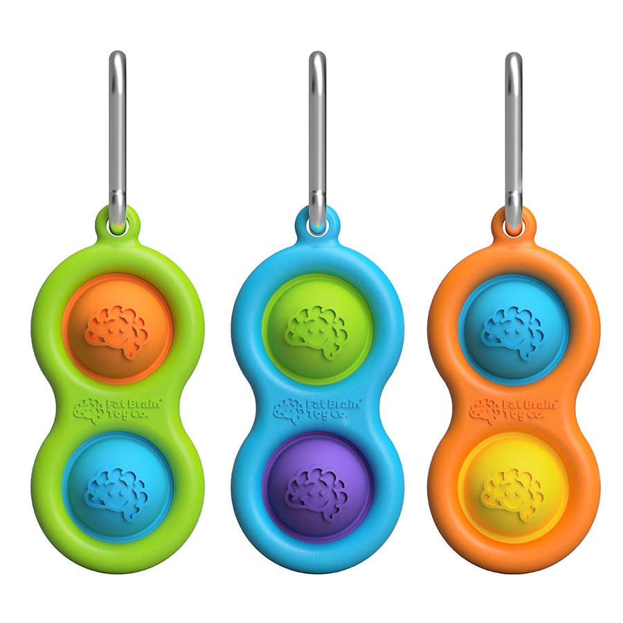Set of three colorful fidget keychains with poppable silicone bubbles in bright plastic frames.
