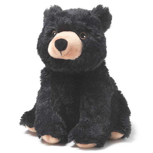 Fluffy black bear plush with tan snout and feet, designed to be microwaved for soothing warmth.